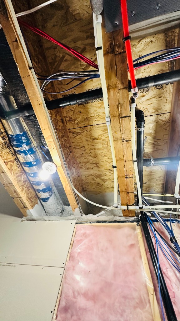 Ceiling insulation, electrical, and HVAC rough-in