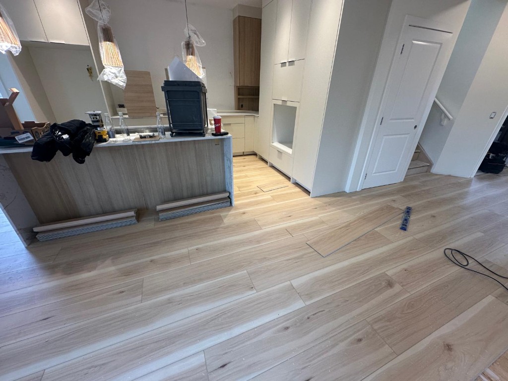 Kitchen island back panel and hardwood floor install